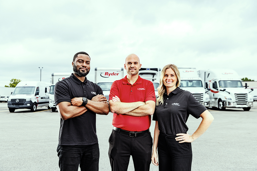 trustworthy freight workers in front of trucks